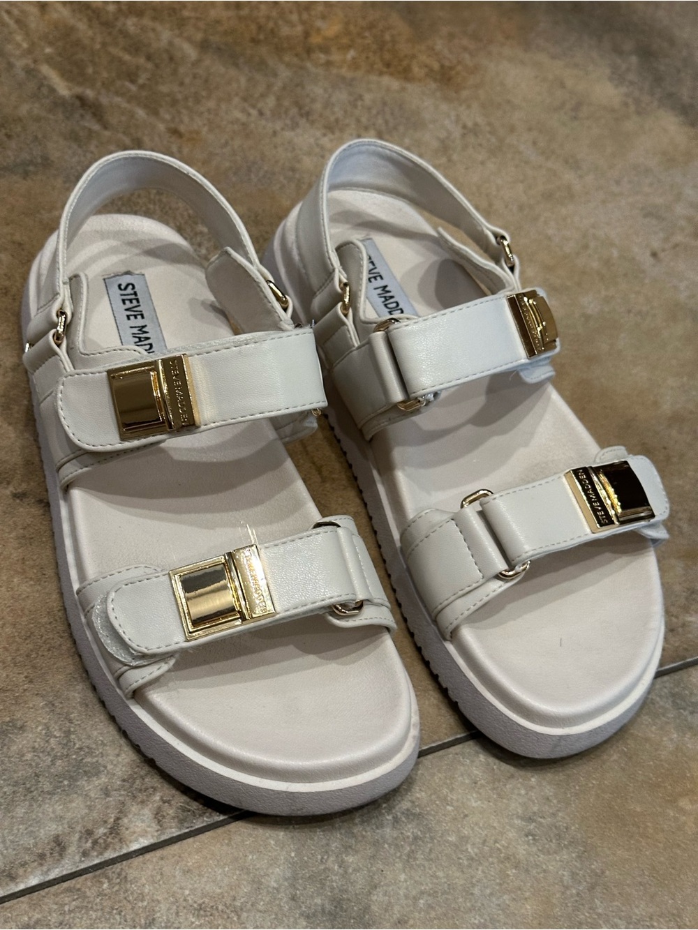Steve Madden womens White Sandals with Gold Buckles